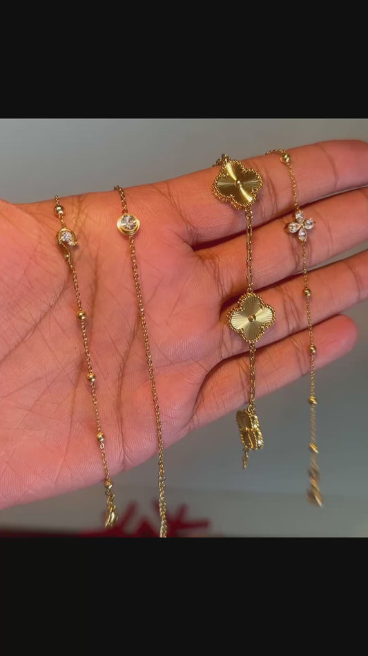 Steal Women bracelets coated in pure 18 K Gold (4 pc set)
